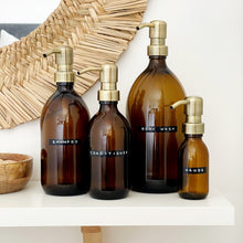 Load image into Gallery viewer, Amber Dispenser Bottle With Stamped Personalised Label And Light Brushed Gold Metal Pump
