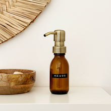 Load image into Gallery viewer, Amber Dispenser Bottle With Stamped Personalised Label And Light Brushed Gold Metal Pump
