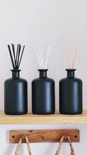 Load and play video in Gallery viewer, Large Matt Black Glass Diffuser Bottle And Reeds
